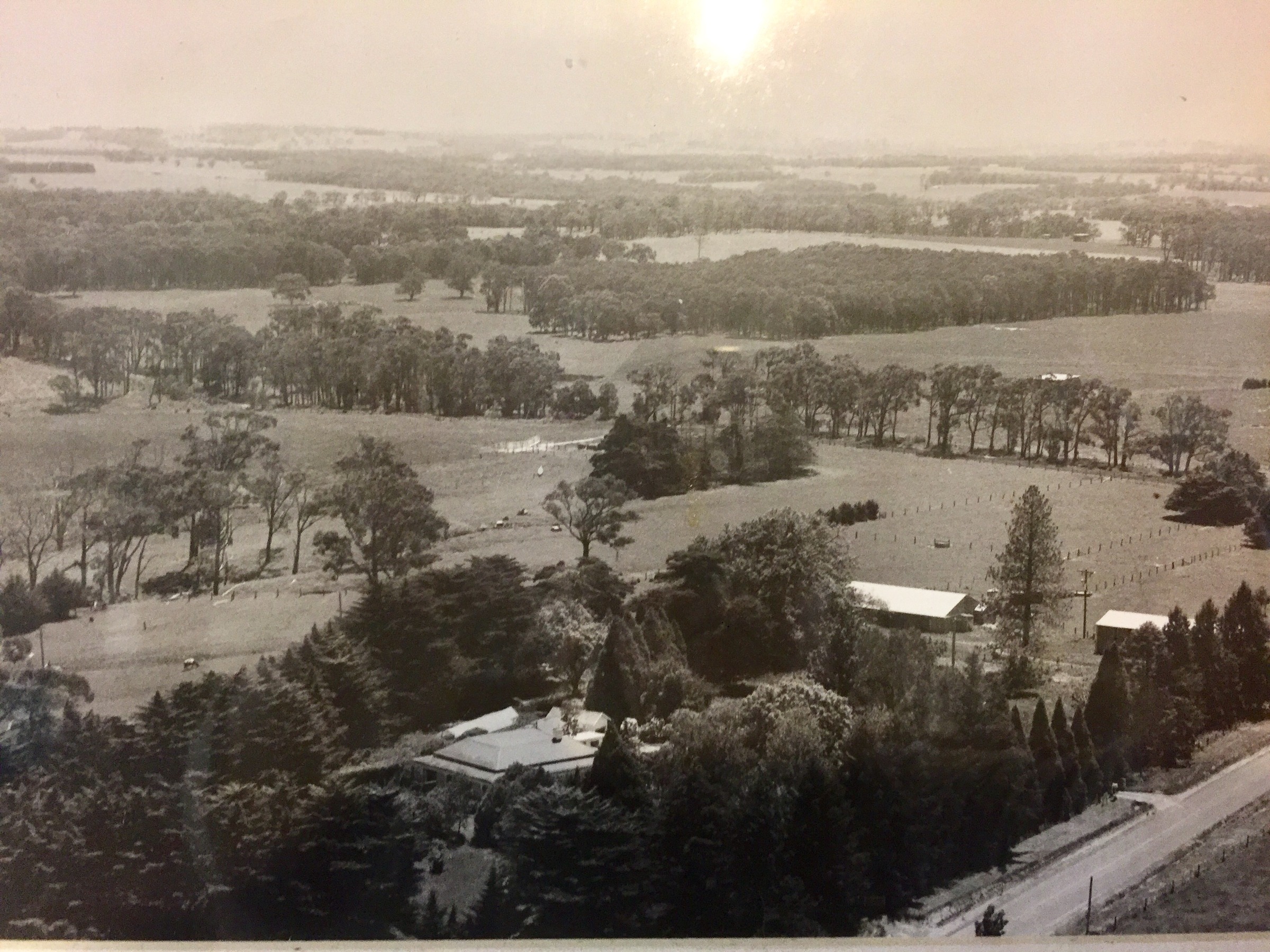 A black-and-white rural landscape photograph shown at Ian’s home