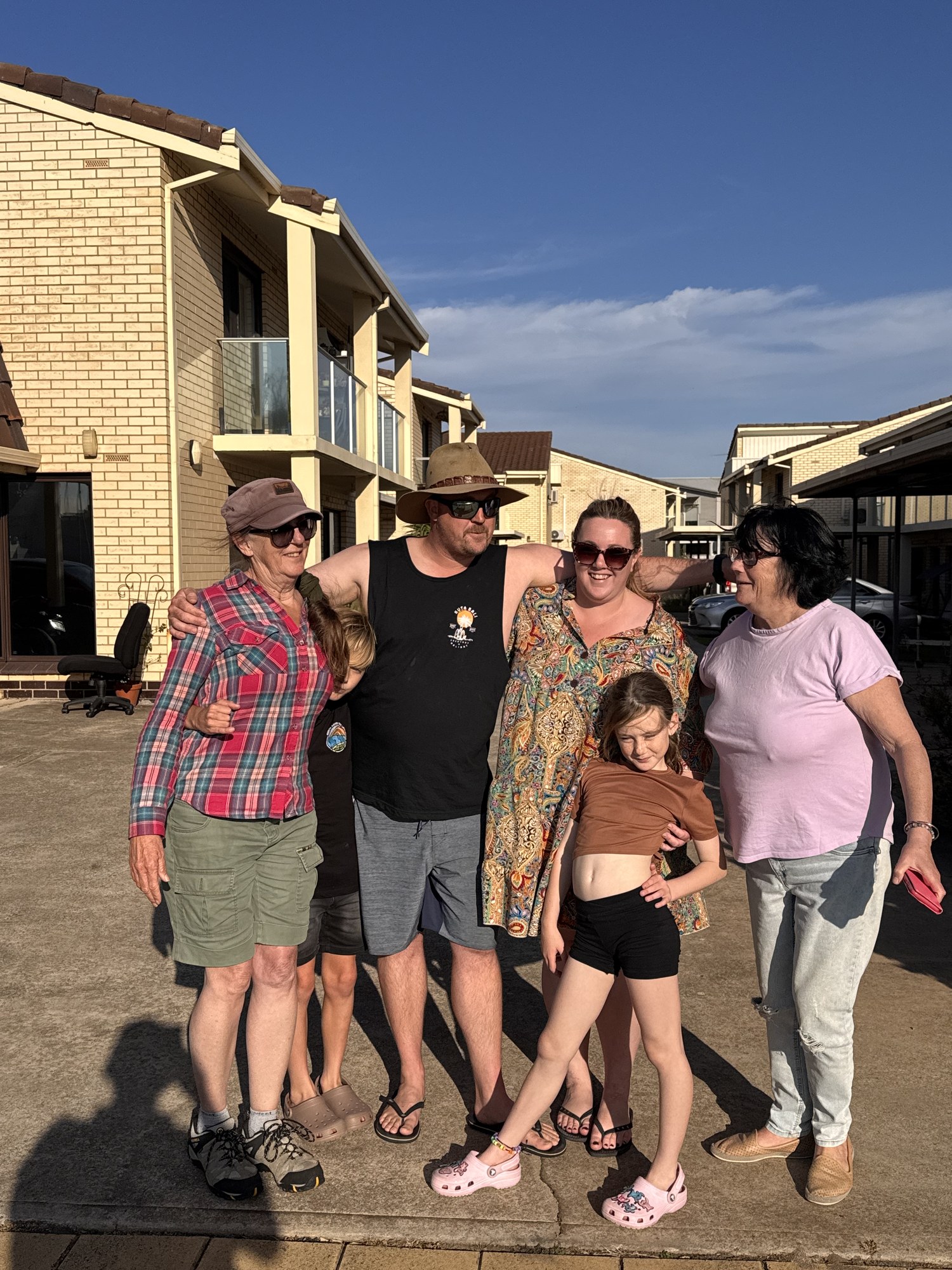 Family group gathered outdoors