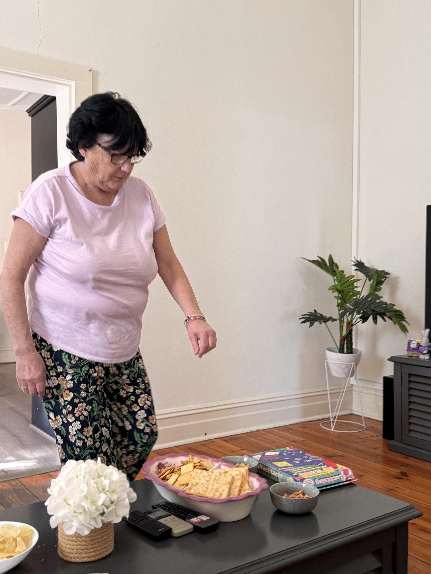 Family members preparing food together at home