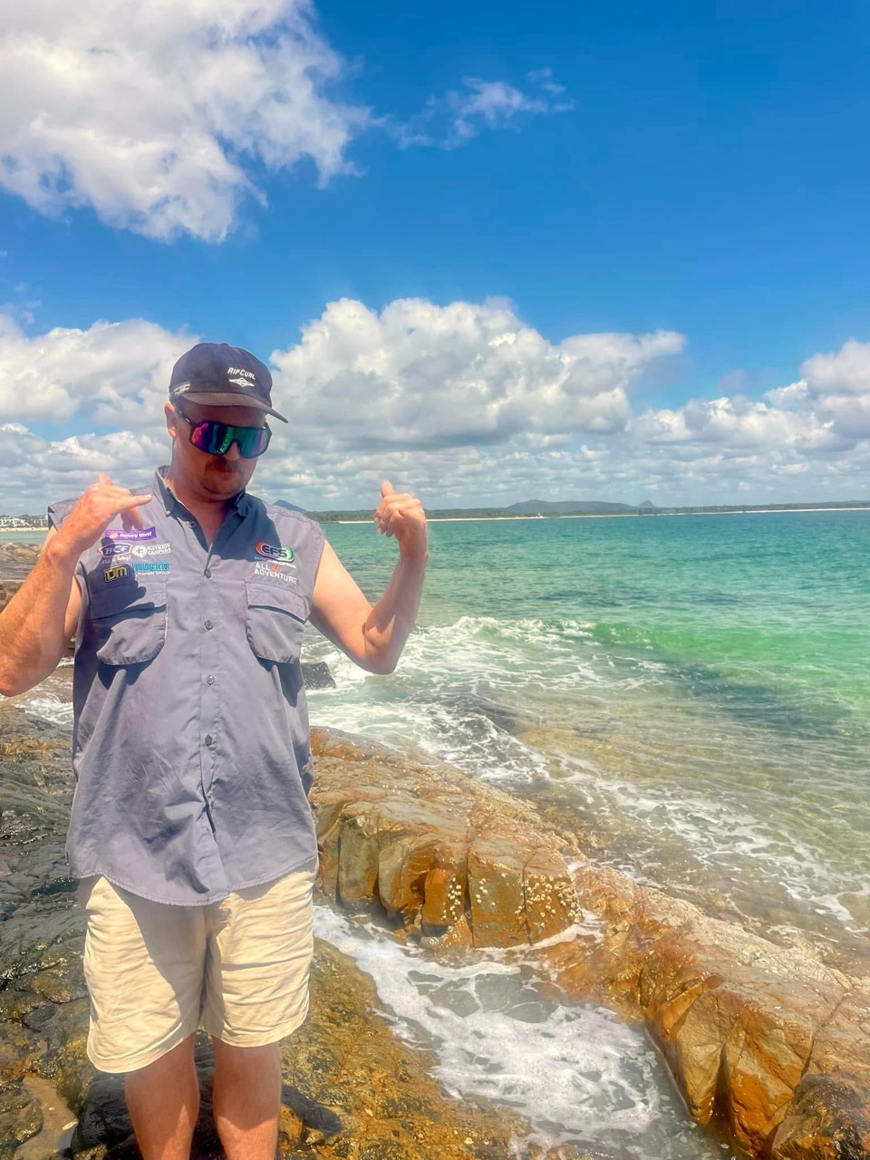 Lawrence standing by the sea