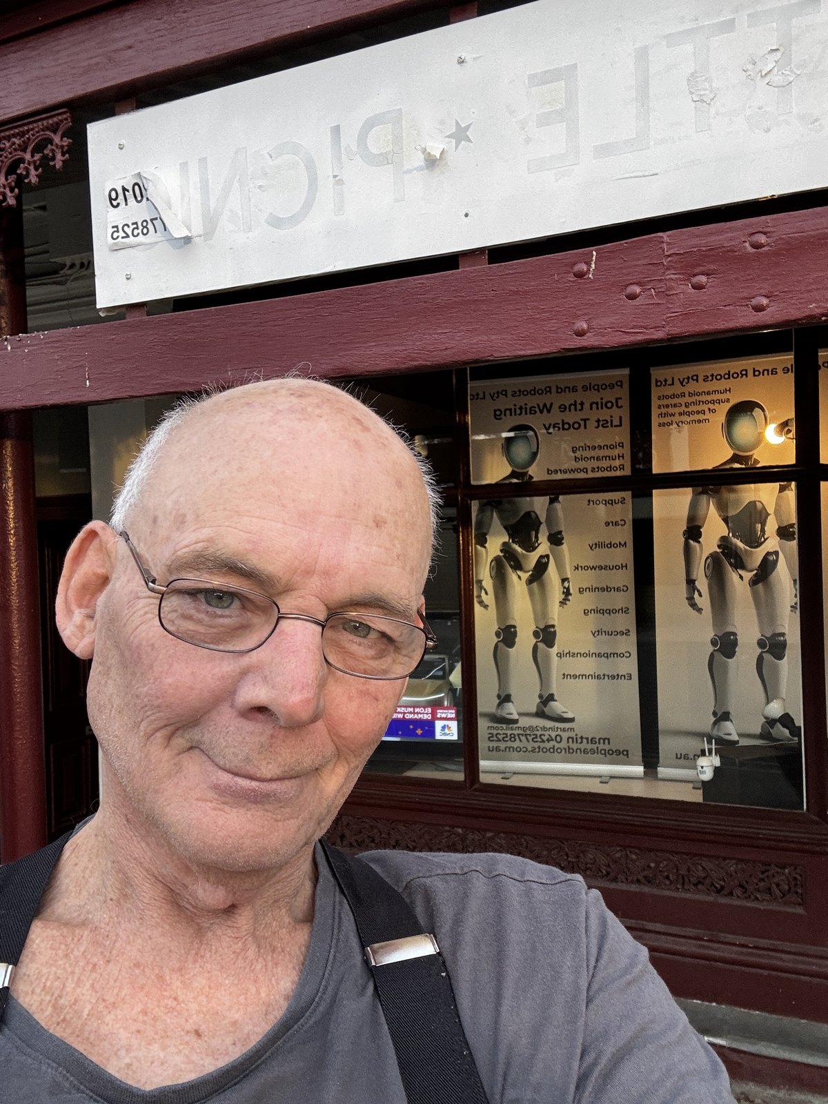 Martin in a close portrait outside a shopfront in Adelaide