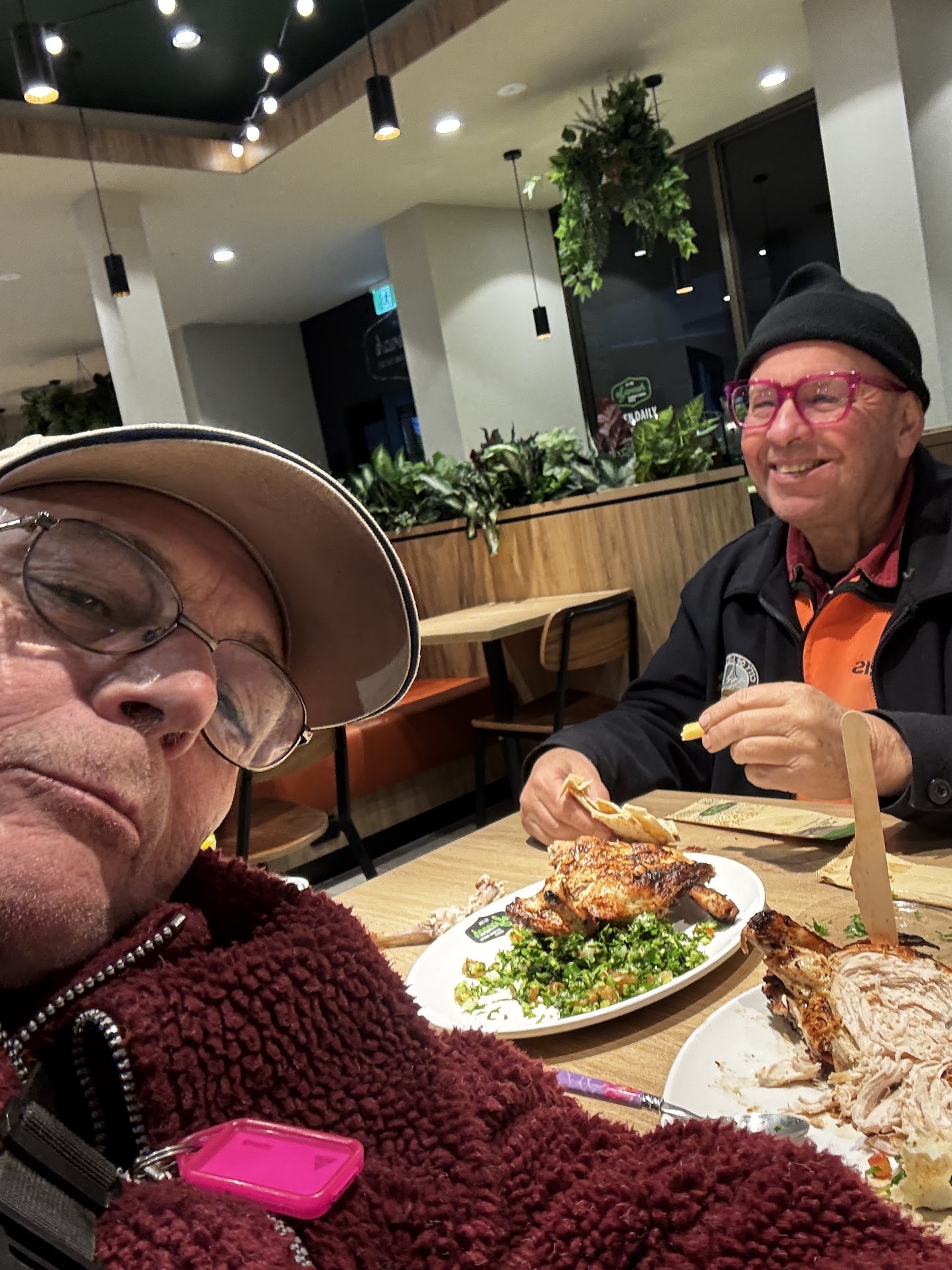 Martin at a dinner table with an unidentified companion in Melbourne