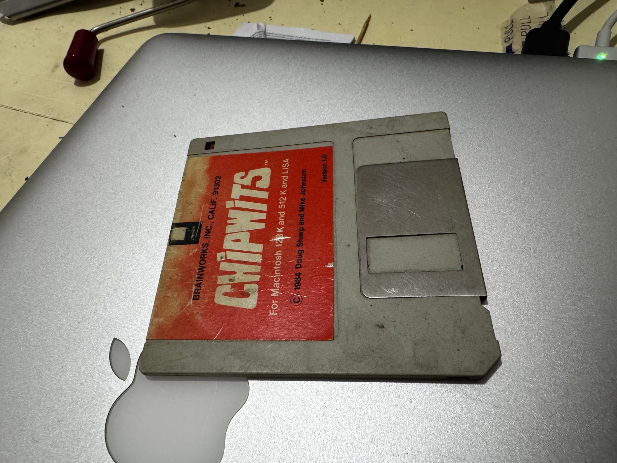 Martin Davies-Roundhill holding the original 1984 ChipWits disk