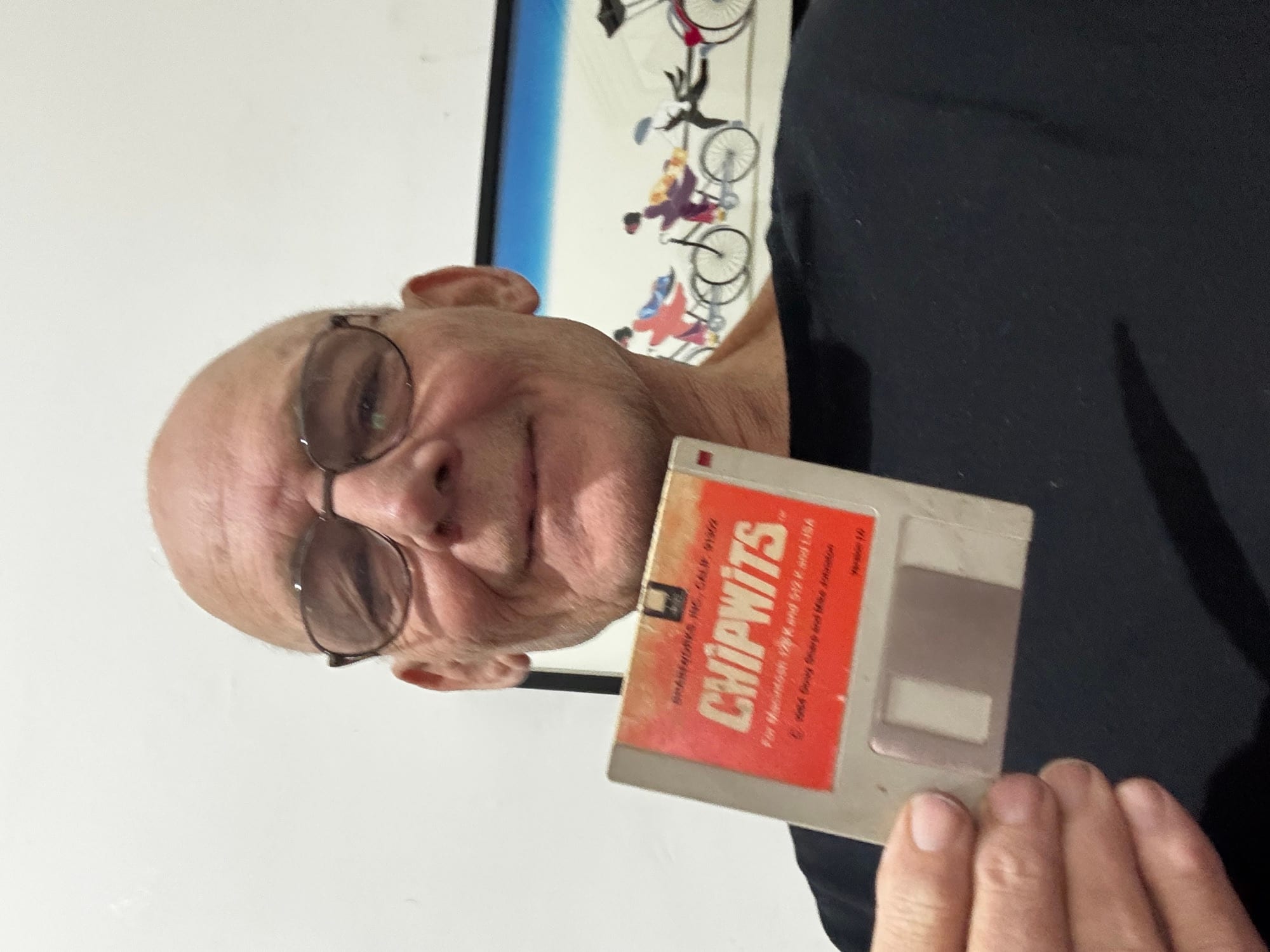 Martin holding ChipWits disk, label forward