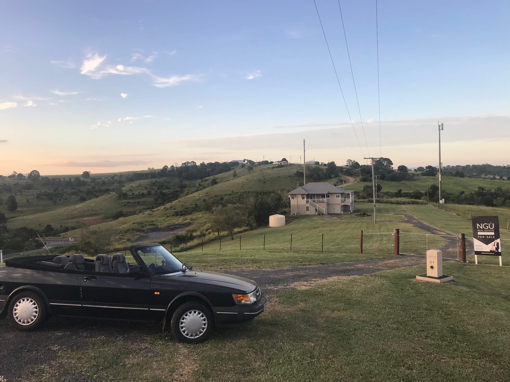 1993 SAAB 900i Cabriolet — roof down, Queensland hills, golden hour